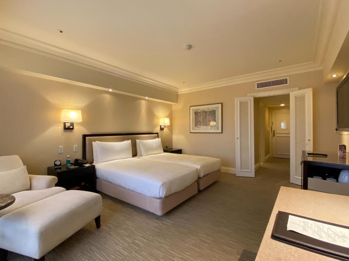 เดอะ เชอร์วูด ไทเป Hotel ภายนอก รูปภาพ A room at the Fullerton Hotel